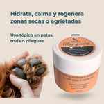 Aplicación del bálsamo Patas y Nariz en almohadillas para regenerar piel seca o agrietada
