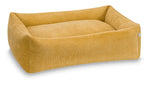 Cama para perros TUDOR color dorado con laterales acolchados