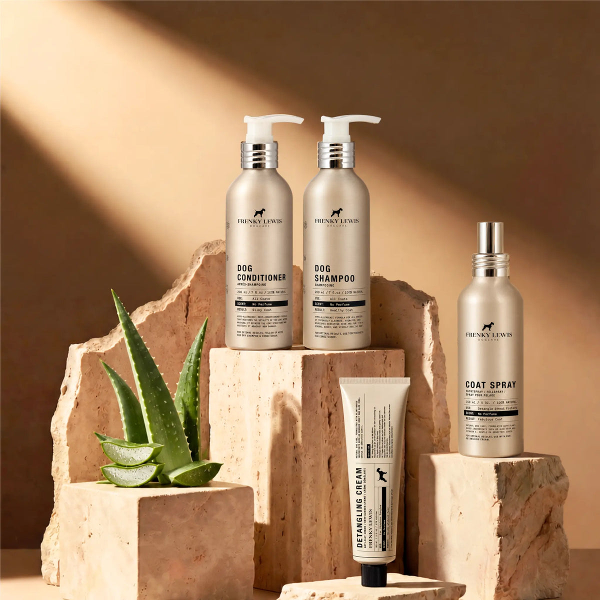 Gama hipoalergénica Frenky Lewis sin perfume para perros, con champú, acondicionador, spray para el pelaje y crema desenredante, presentada junto a aloe vera.
