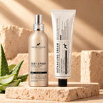 Pack Anti-Nudos con spray desenredante y protector térmico y crema desenredante para perros, de 150 ml cada uno, sobre una base de piedra clara.