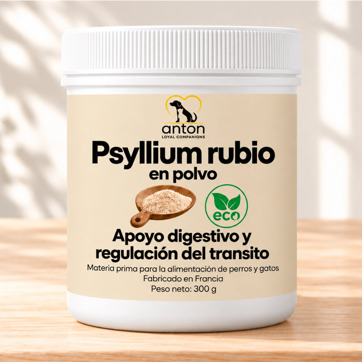 Psyllium rubio en polvo de ANTON Loyal Companions para perros y gatos, apoyo digestivo y regulación del tránsito intestinal sobre mesa de madera clara.
